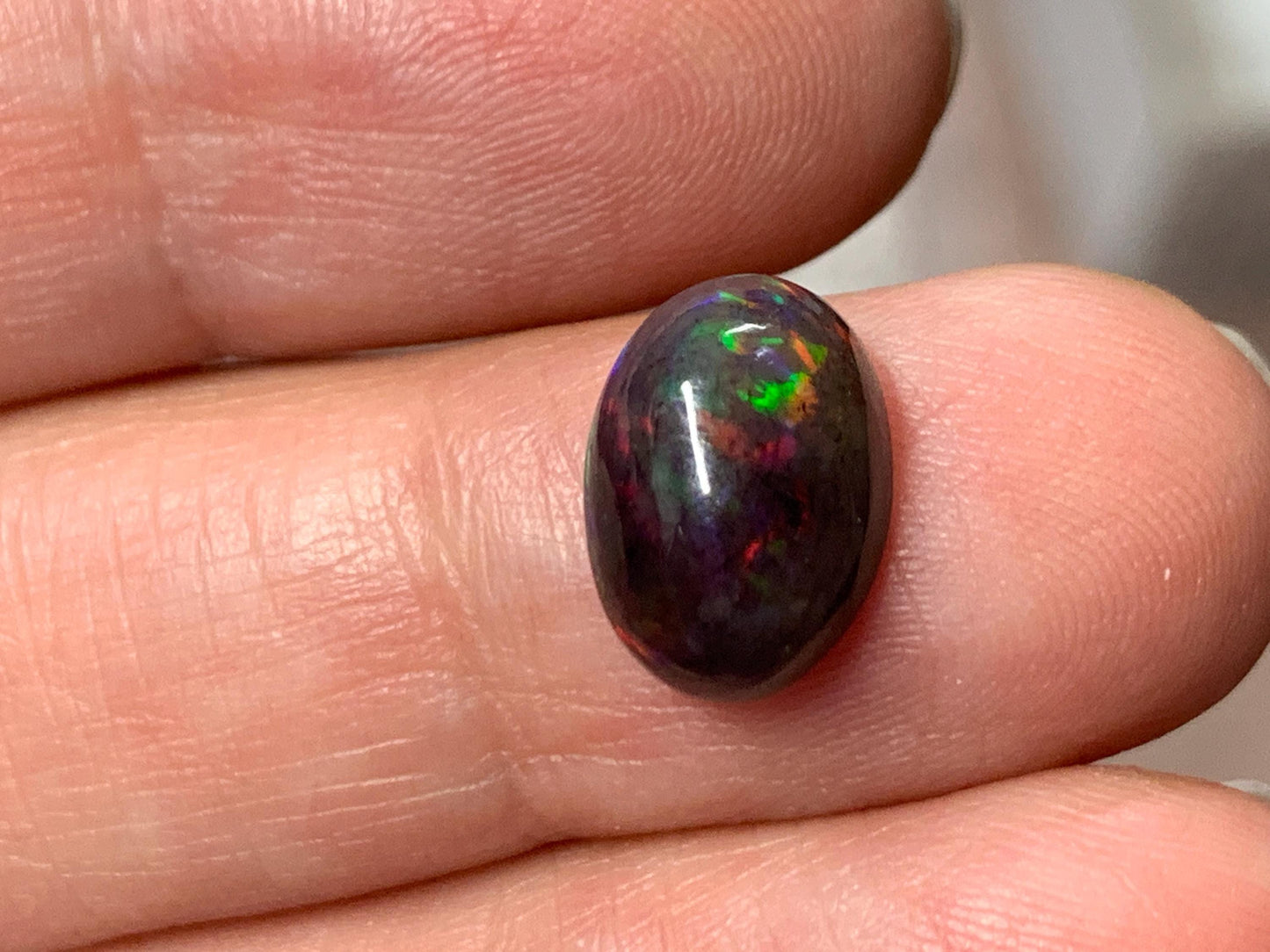 Black Ethiopian Opal oval 8x11x45mm cabochon