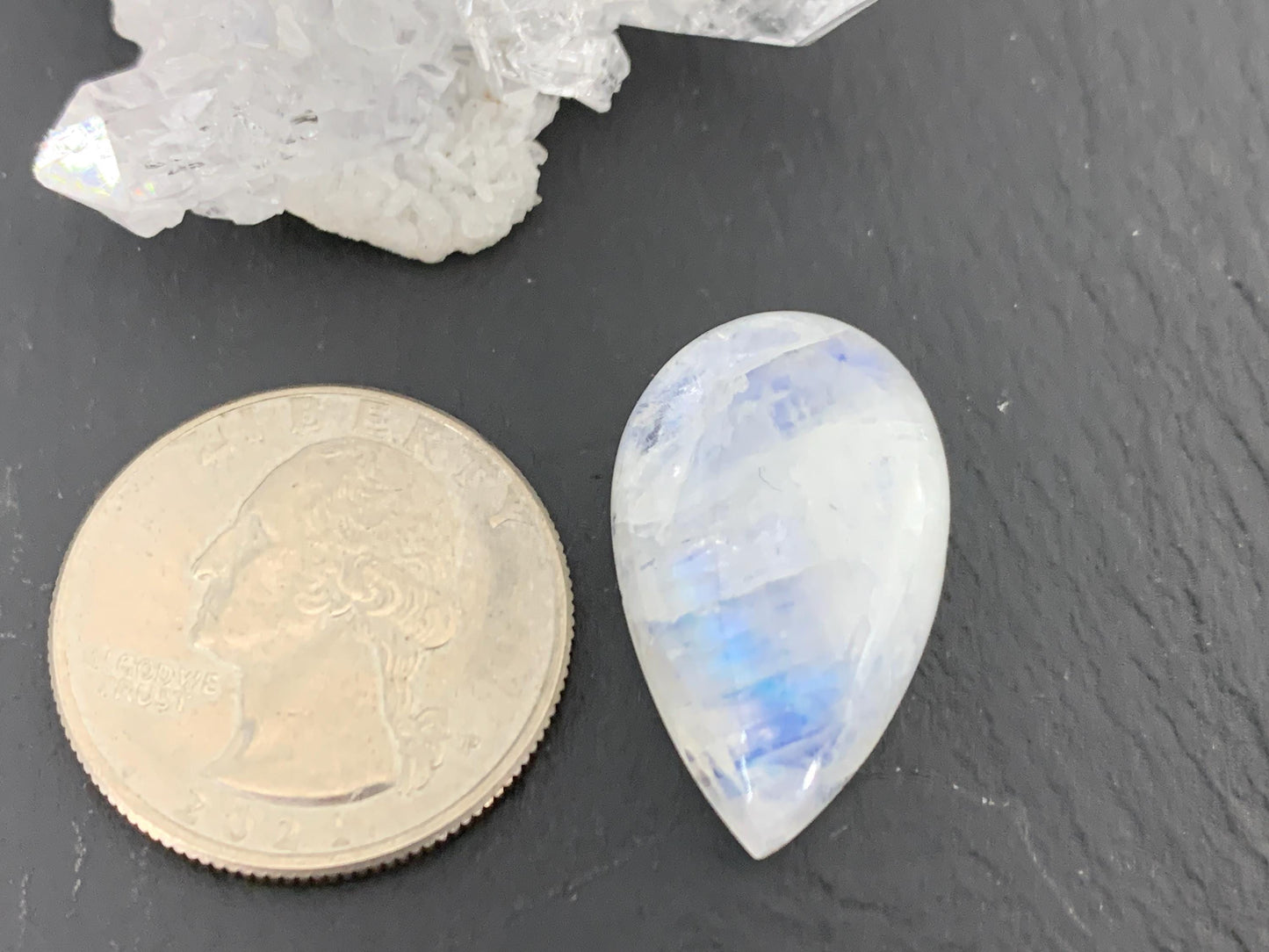 Rainbow Moonstone 26x16x8mm cabochon