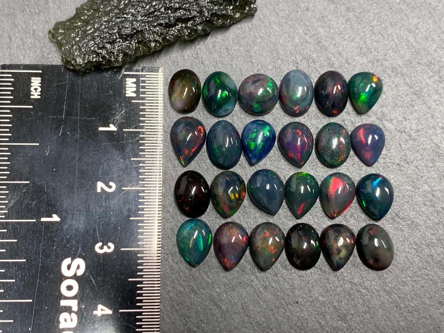 Black Ethiopian Opal 6x8mm cabochon