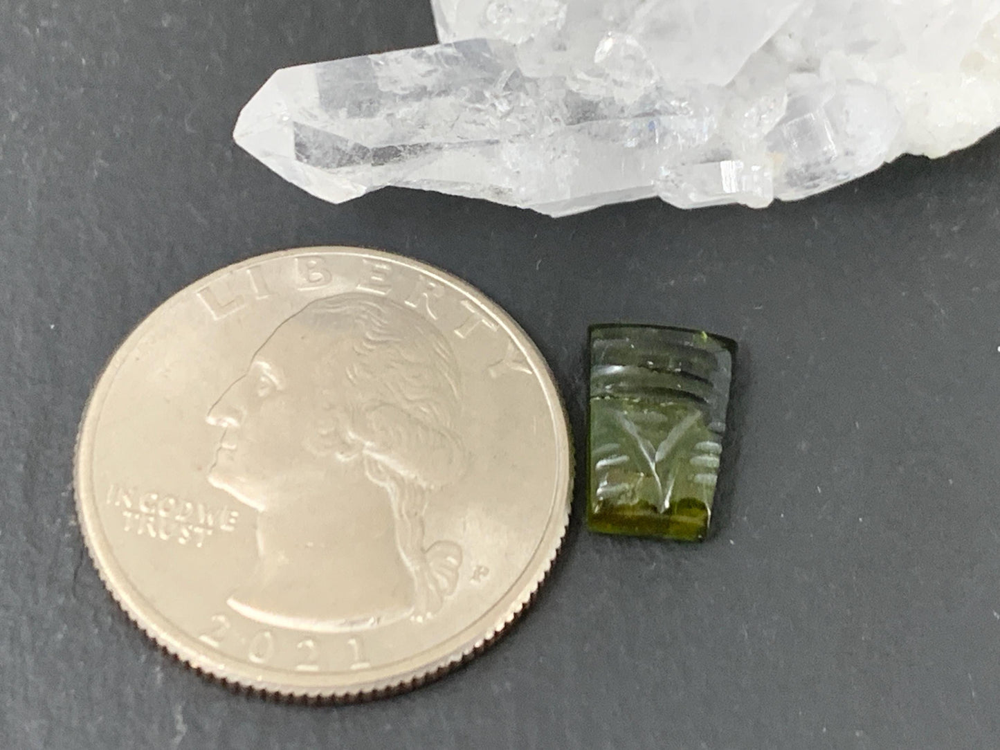 Carved Tourmaline 7x10x3mm cabochon