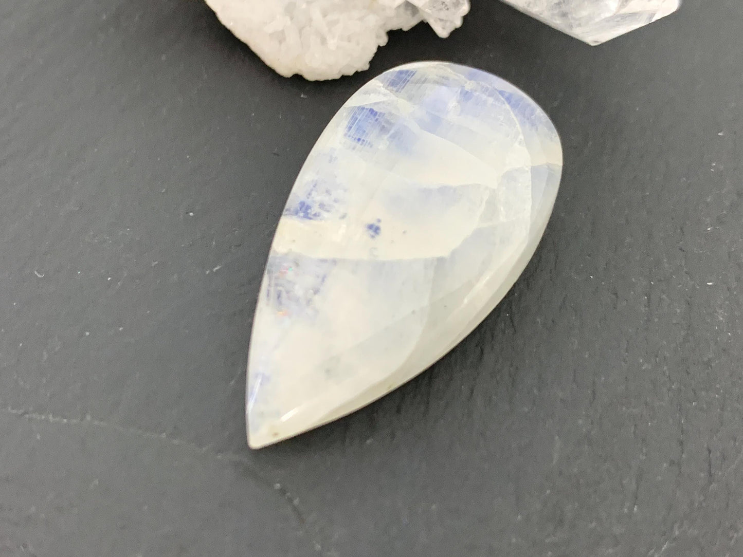 Rainbow Moonstone 30x16x8mm cabochon