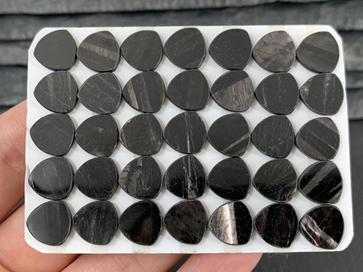 Flat Hypersthene curved triangle 10mm cabochon - Calibrated cabochons