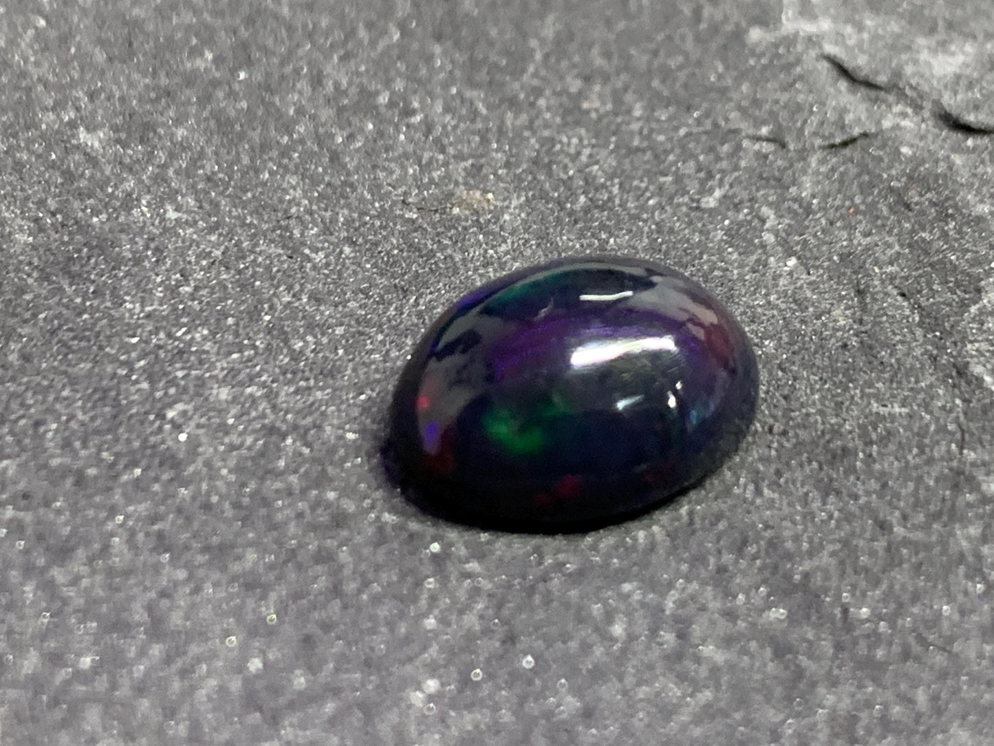 Black Ethiopian Opal oval 9x11x4mm cabochon