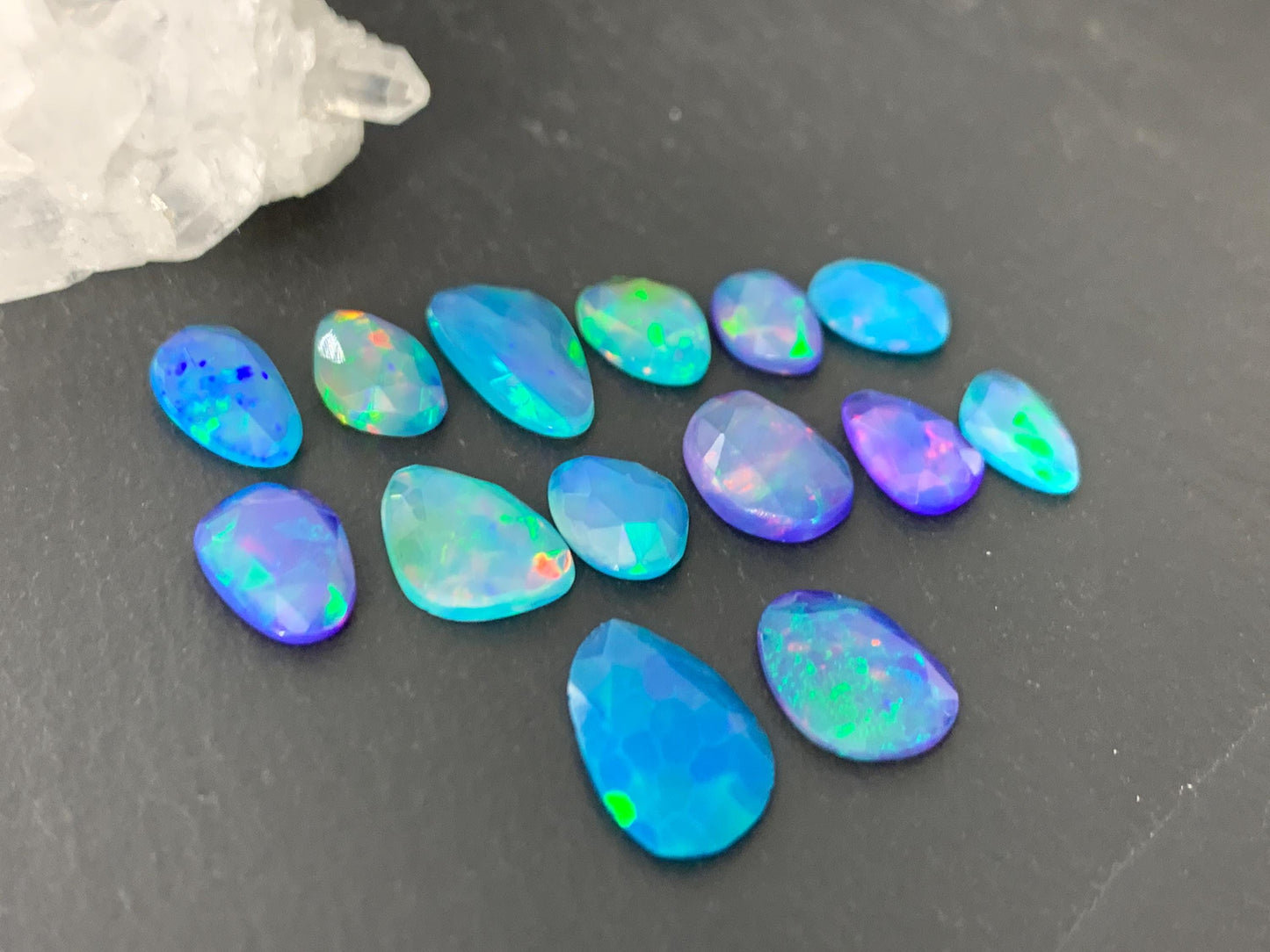 Faceted Blue Ethiopian Opal 8-14mm long cabochon