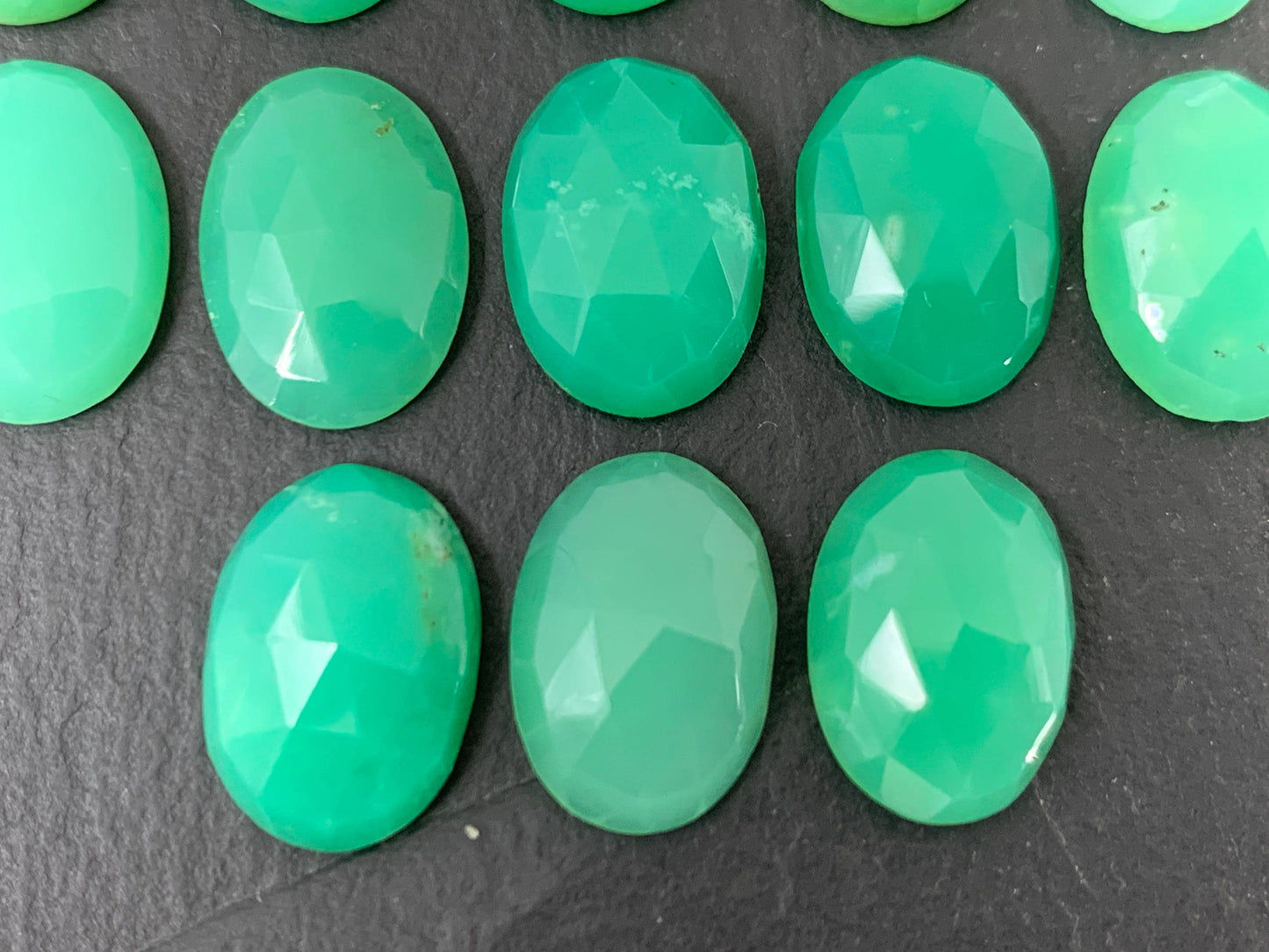 Faceted Chrysoprase oval 10x14mm cabochon