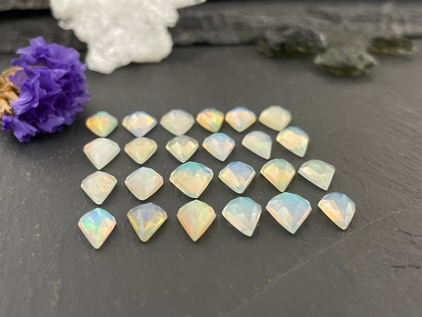Faceted Ethiopian Opal kite 7-8mm long cabochon