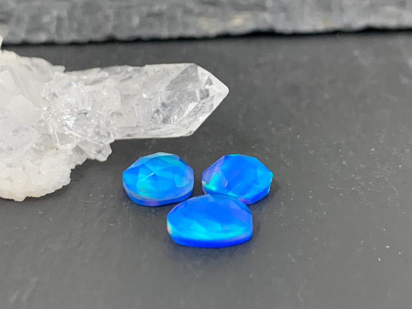 Faceted Aurora Opal free form 8-9mm long doublet cabochons