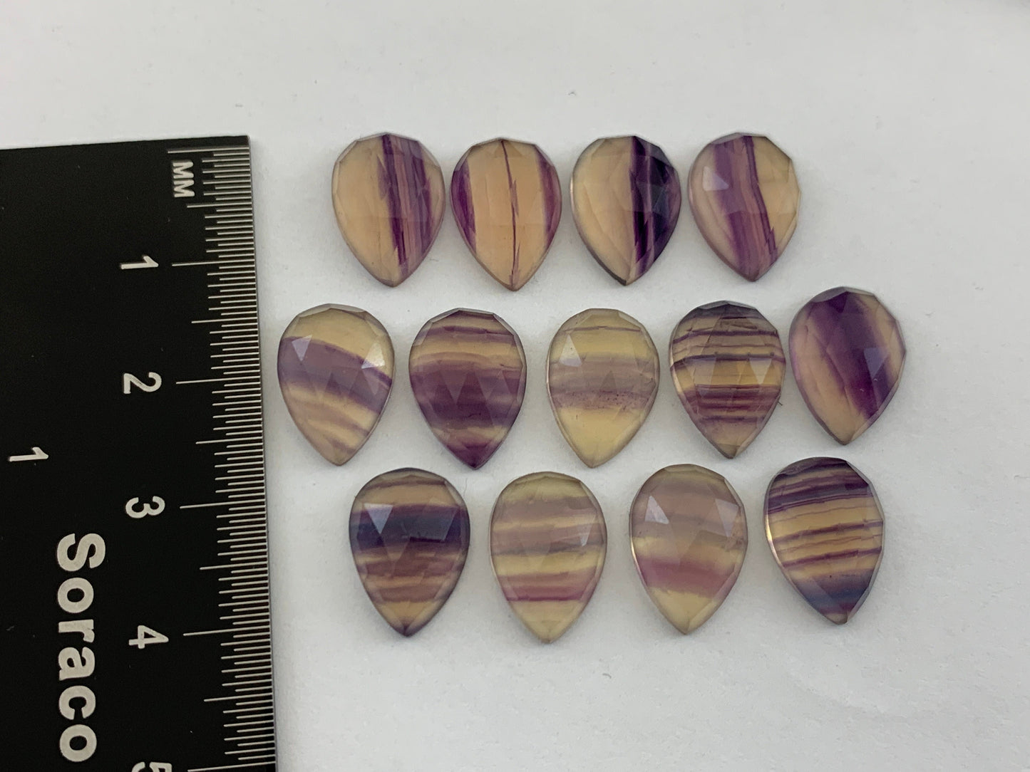 Faceted Fluorite pear 10x13mm cabochon