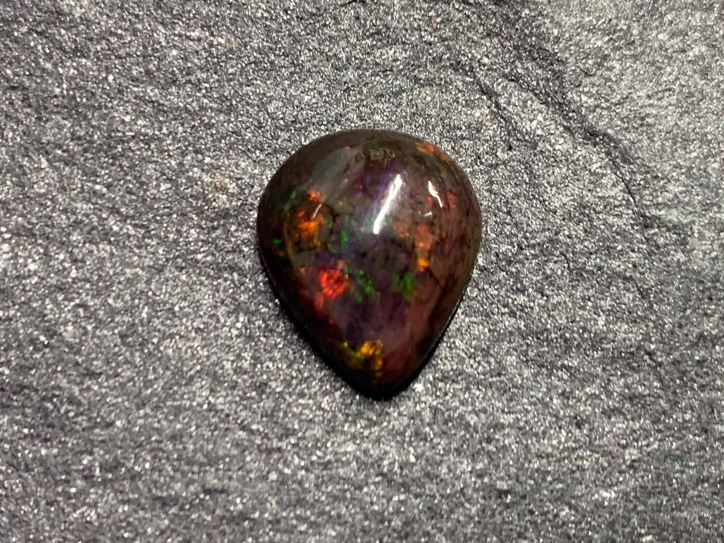 Black Ethiopian Opal pear 10x12x4mm cabochon