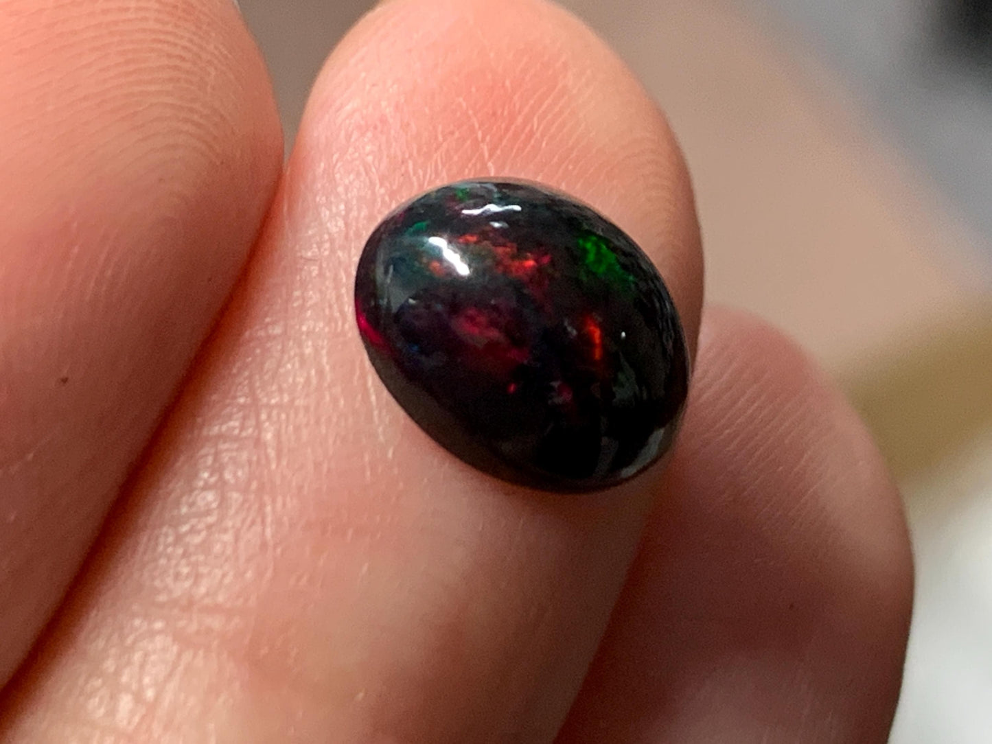Natural Ethiopian Black Opal 8x10x4mm cabochon