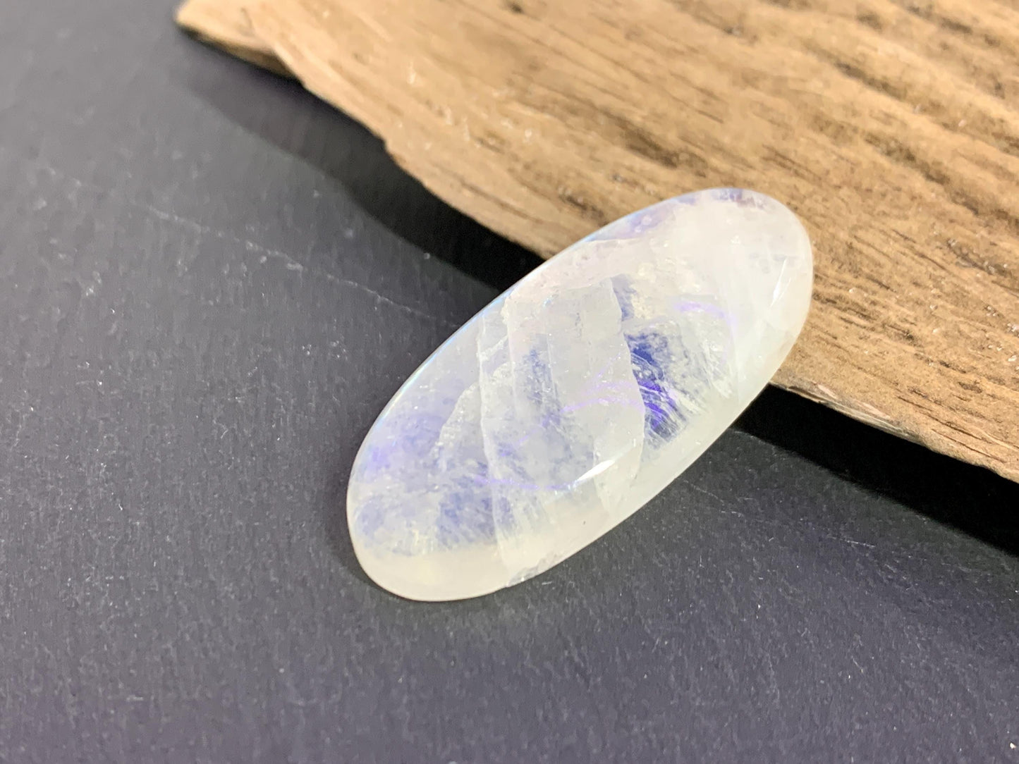 Rainbow Moonstone oval 37x17x7mm cabochon