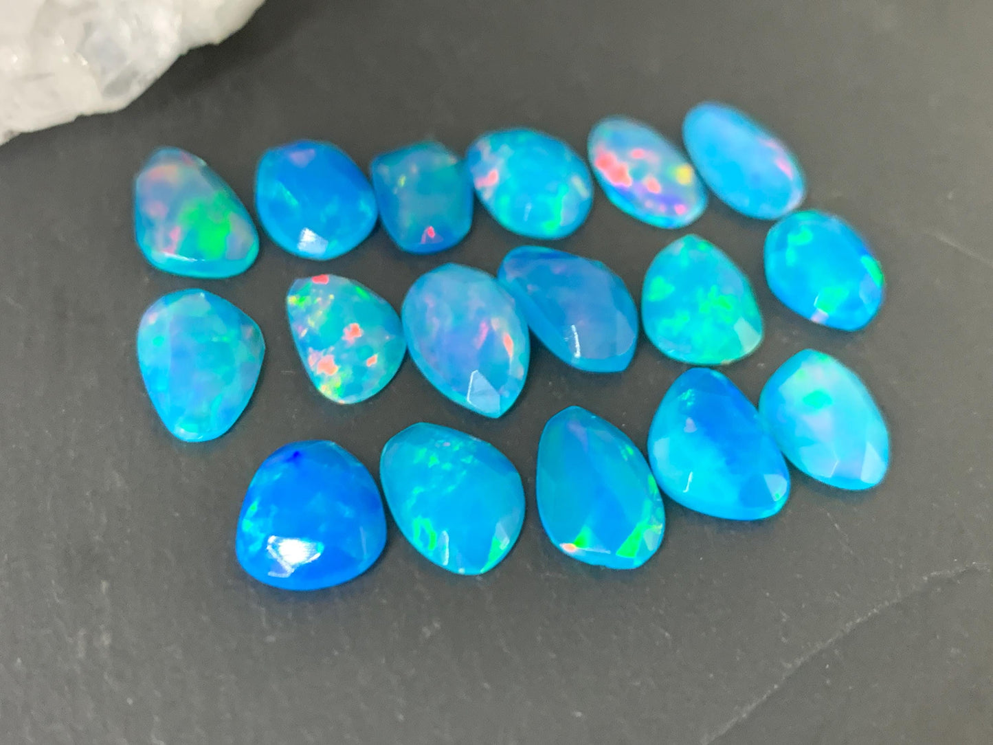 Faceted Blue Ethiopian Opal 9-10mm long cabochon