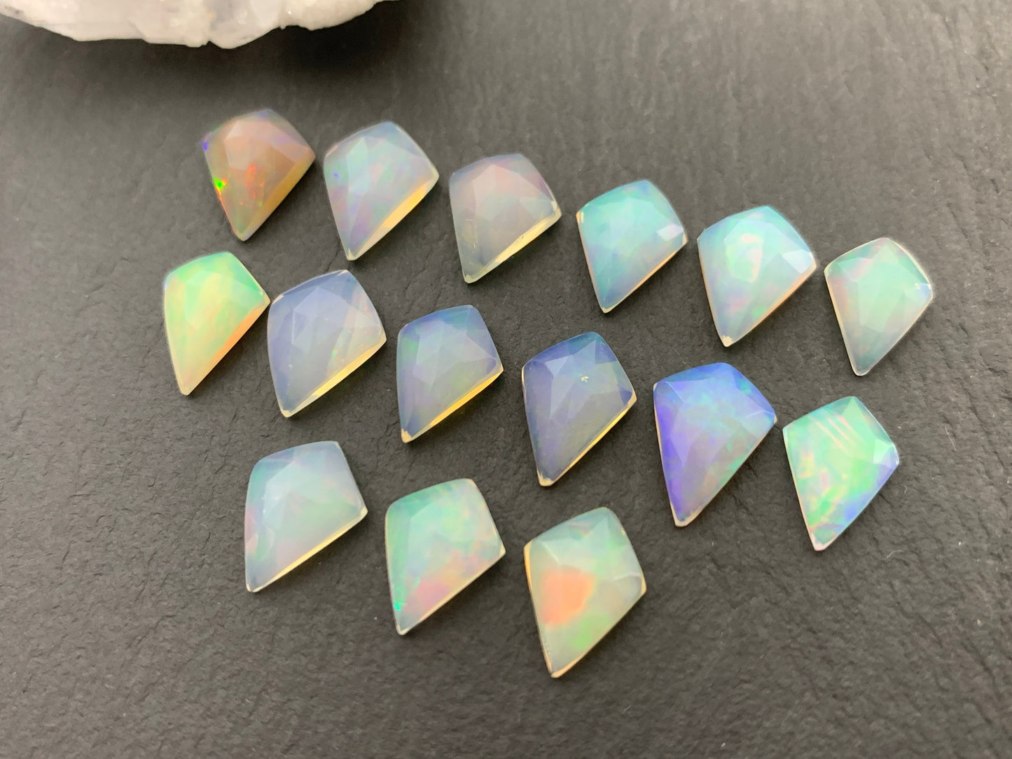 Faceted Welo Opal kite 11-11.8mm cabochon