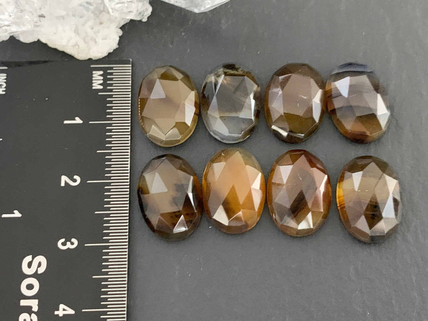 Faceted Montana Agate oval 10x14mm cabochon