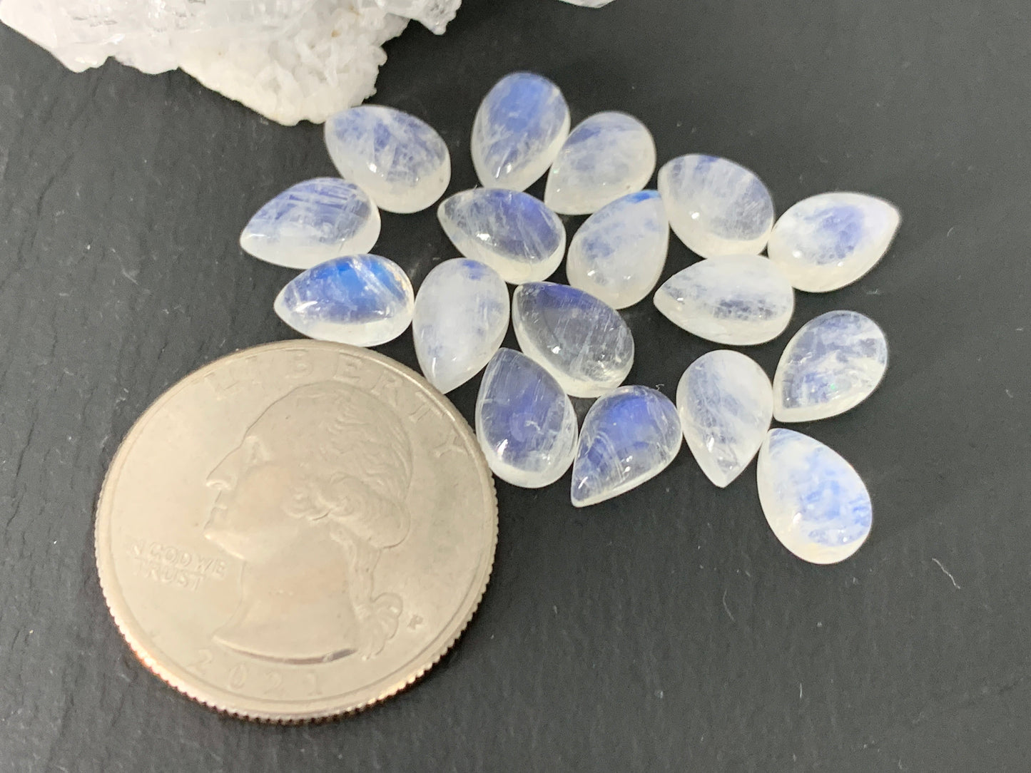 Rainbow Moonstone pear 6x9mm cabochon