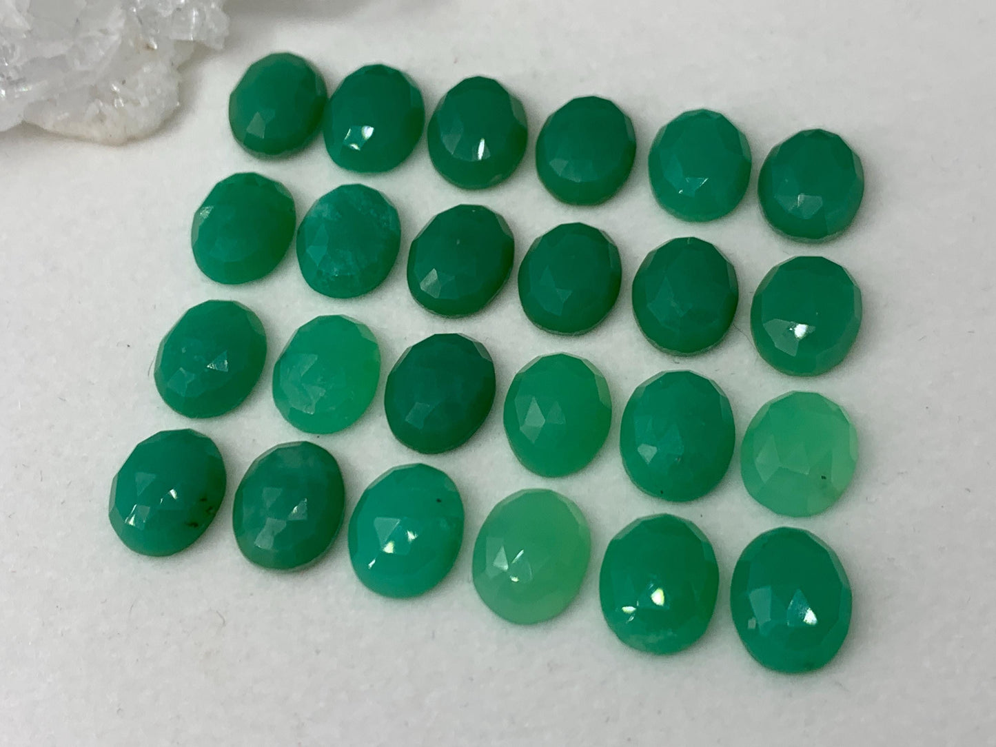 Faceted Chrysoprase oval 8x10mm cabochon