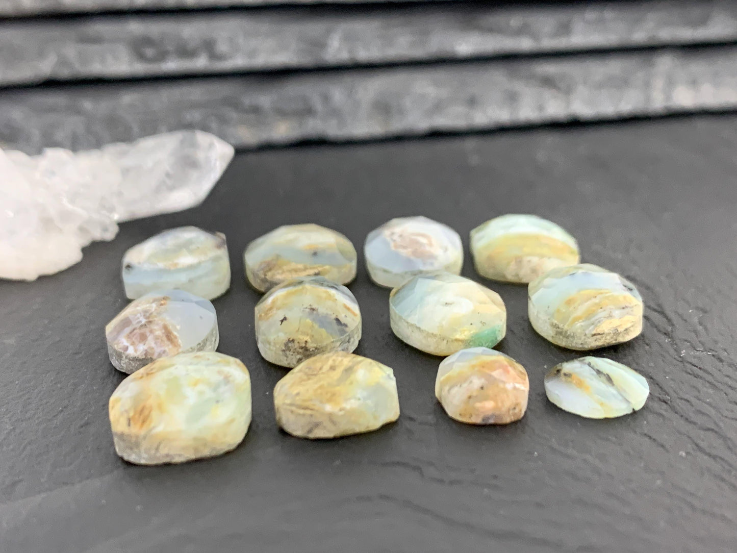 Faceted Peruvian Opal 8-14mm long cabochon.