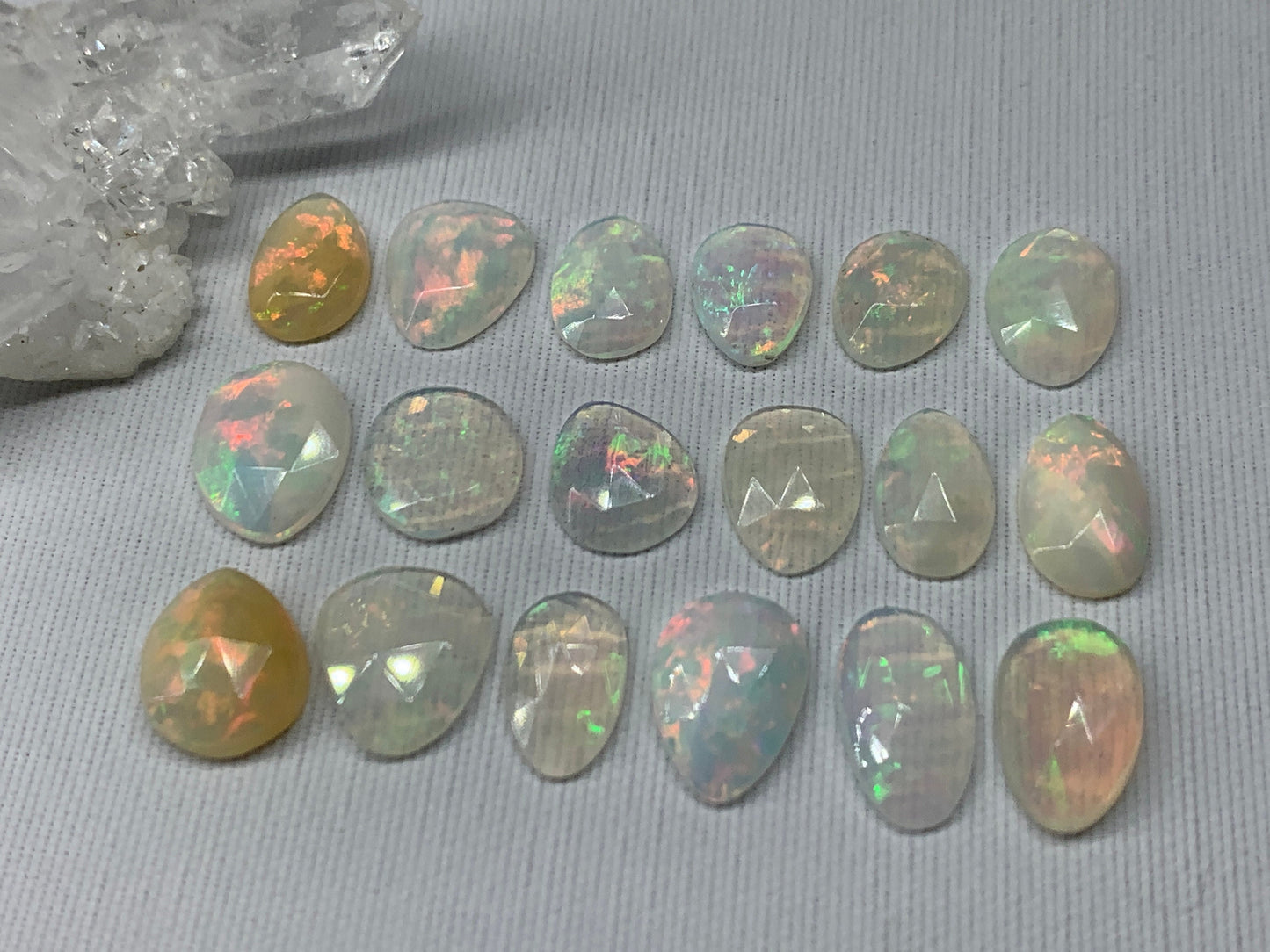 Faceted Ethiopian Opal 10-12mm long cabochon