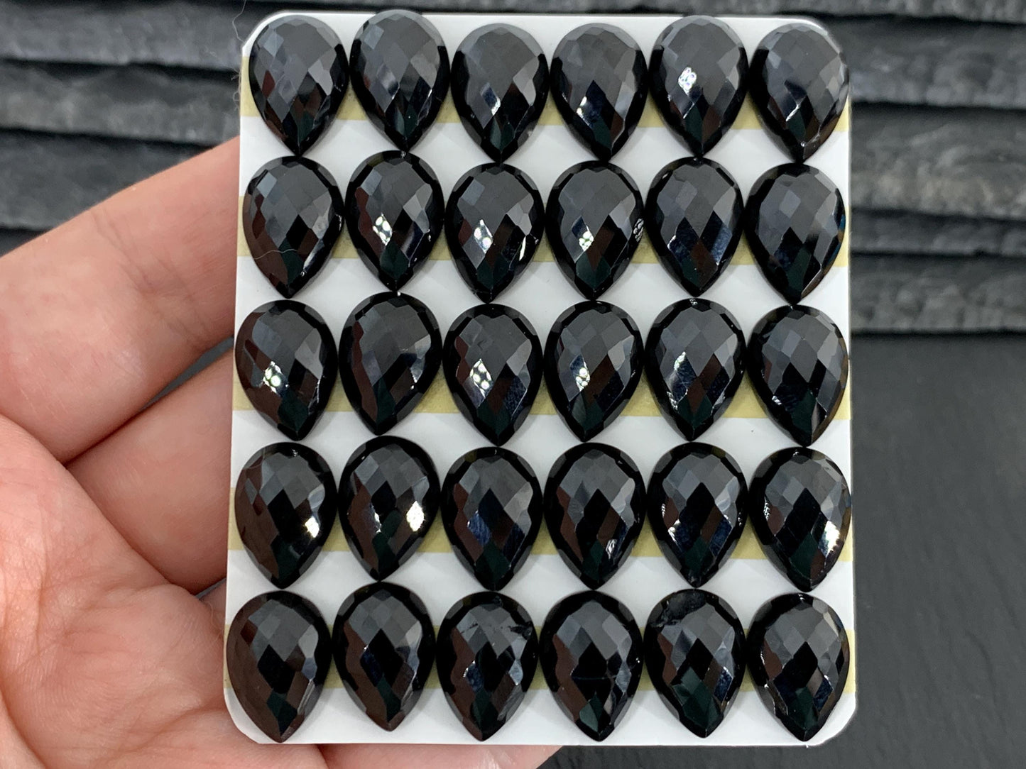 Faceted Black Spinel pear 10x14mm cabochon