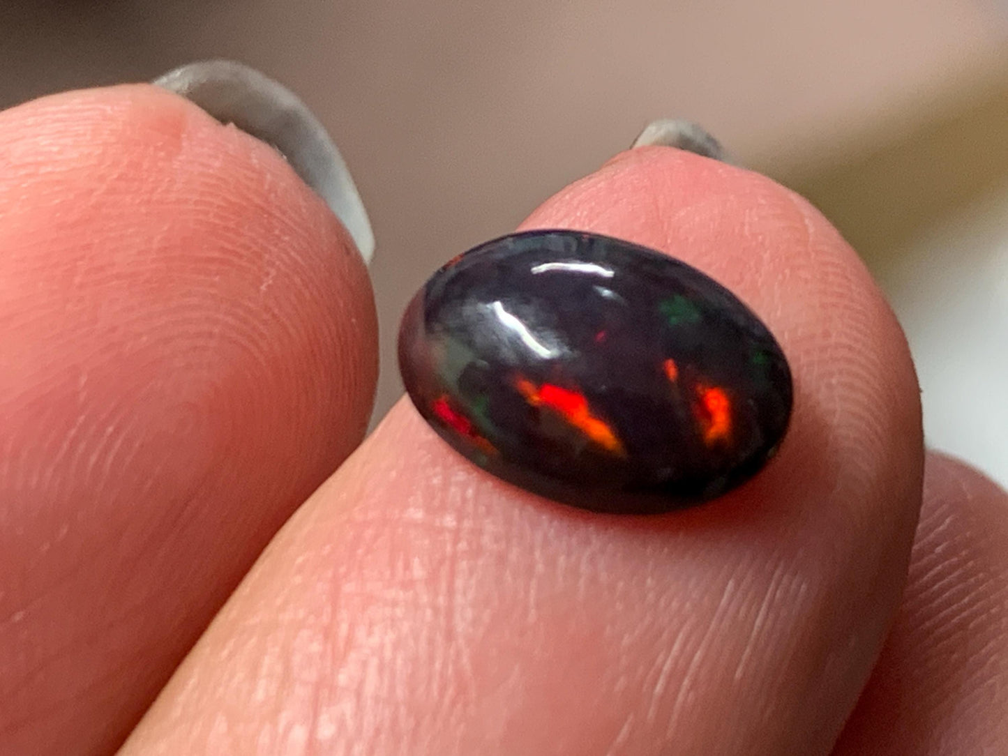 Natural Ethiopian Black Opal 7x9x3mm cabochon