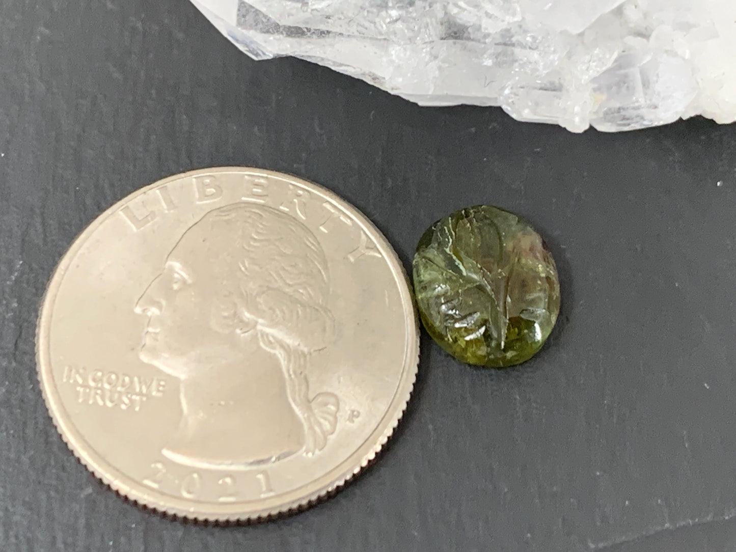 Carved Tourmaline 9x11x4mm cabochon
