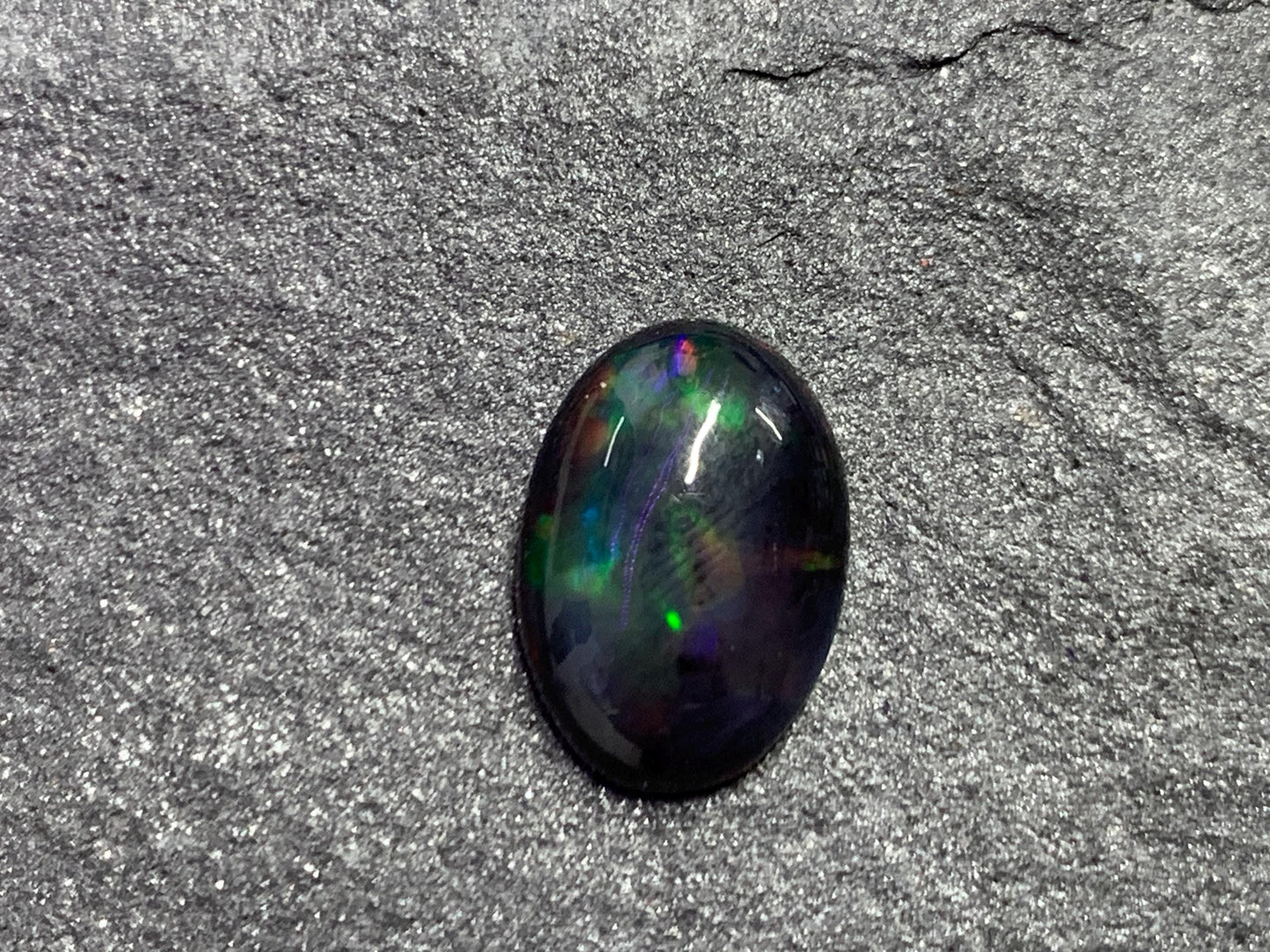 Black Ethiopian Opal oval 9x13x3.5mm cabochon