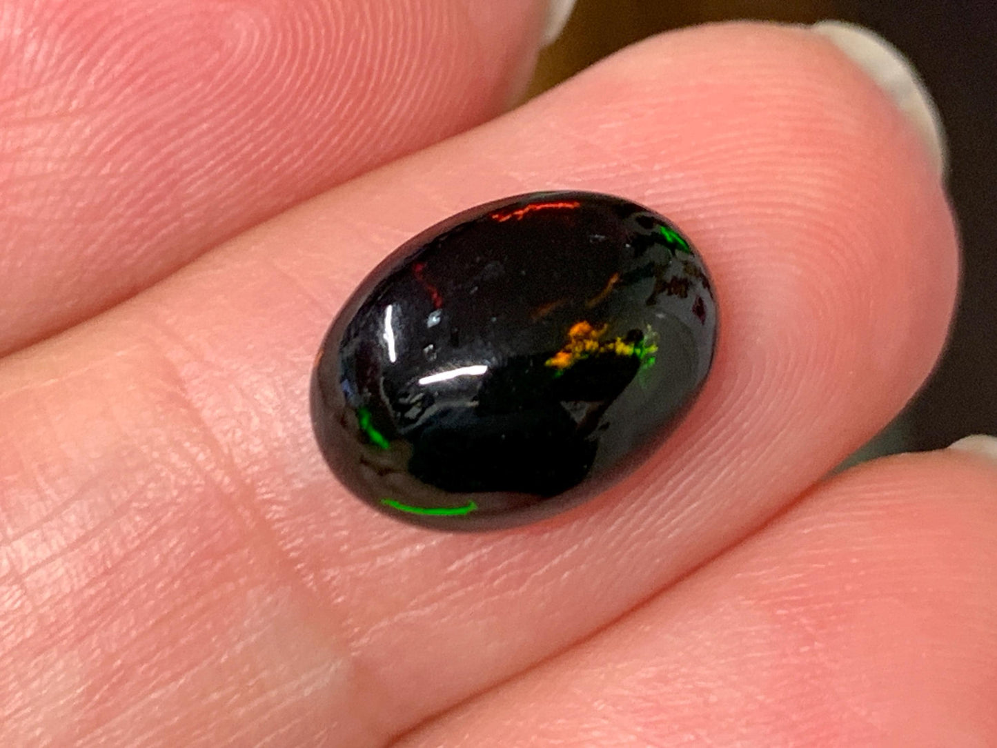 Natural Ethiopian Black Opal 9x12x4mm cabochon