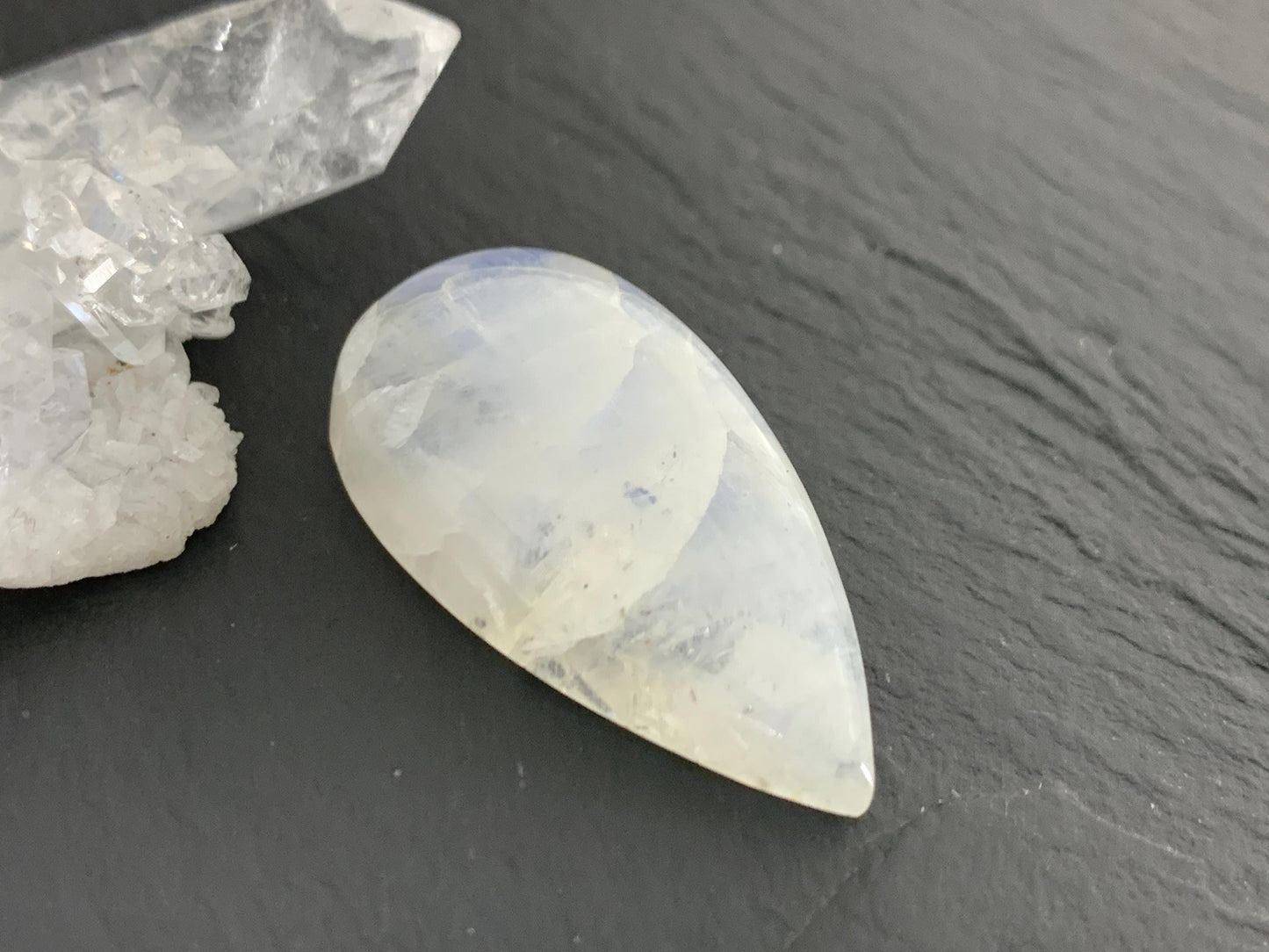 Rainbow Moonstone 30x16x8mm cabochon