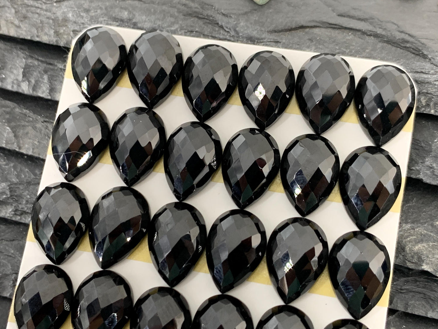 Faceted Black Spinel pear 10x14mm cabochon