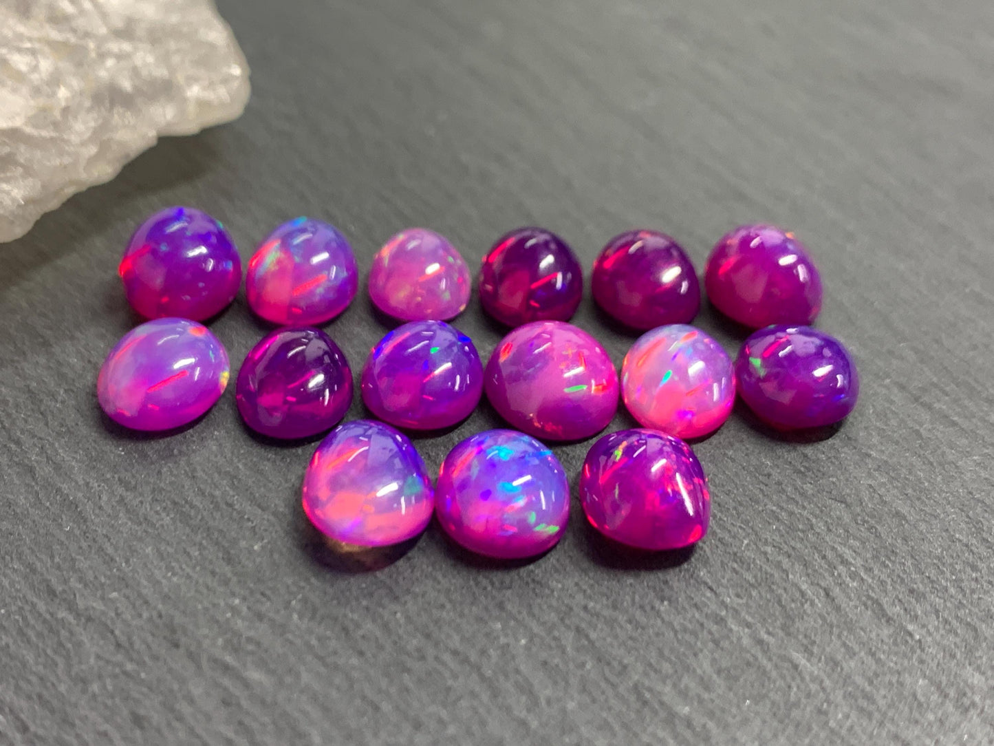 Ethiopian Opal oval 8x10mm cabochon - Natural Opal smoked to purple color