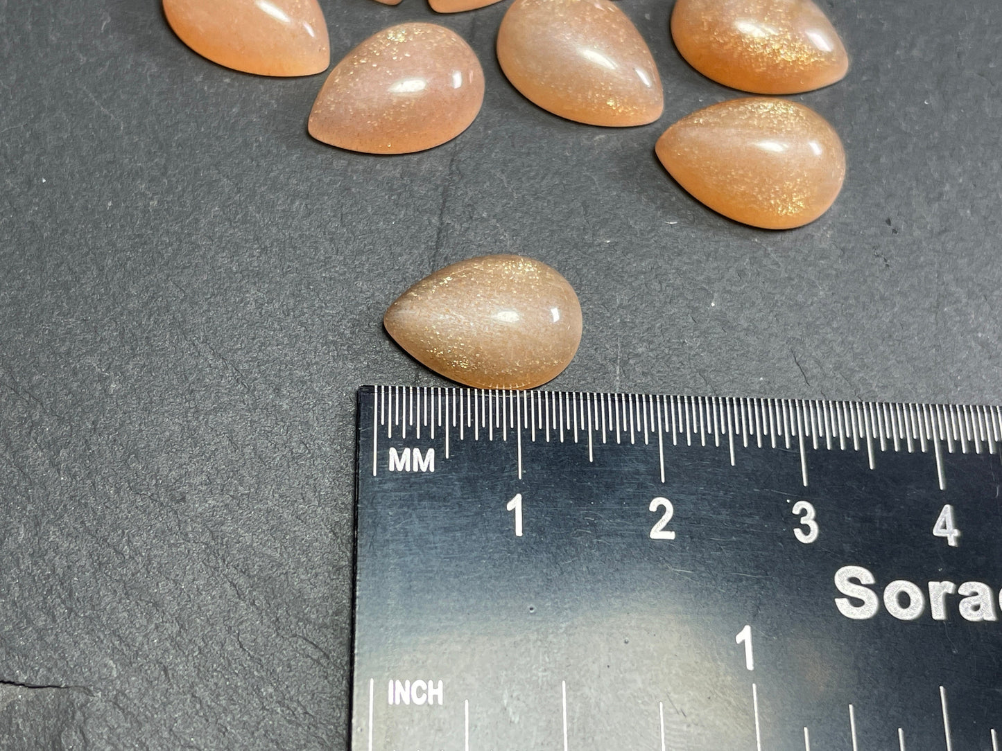 Goldsand Sunstone pear 10x14mm cabochon - Calibrated Cabochons