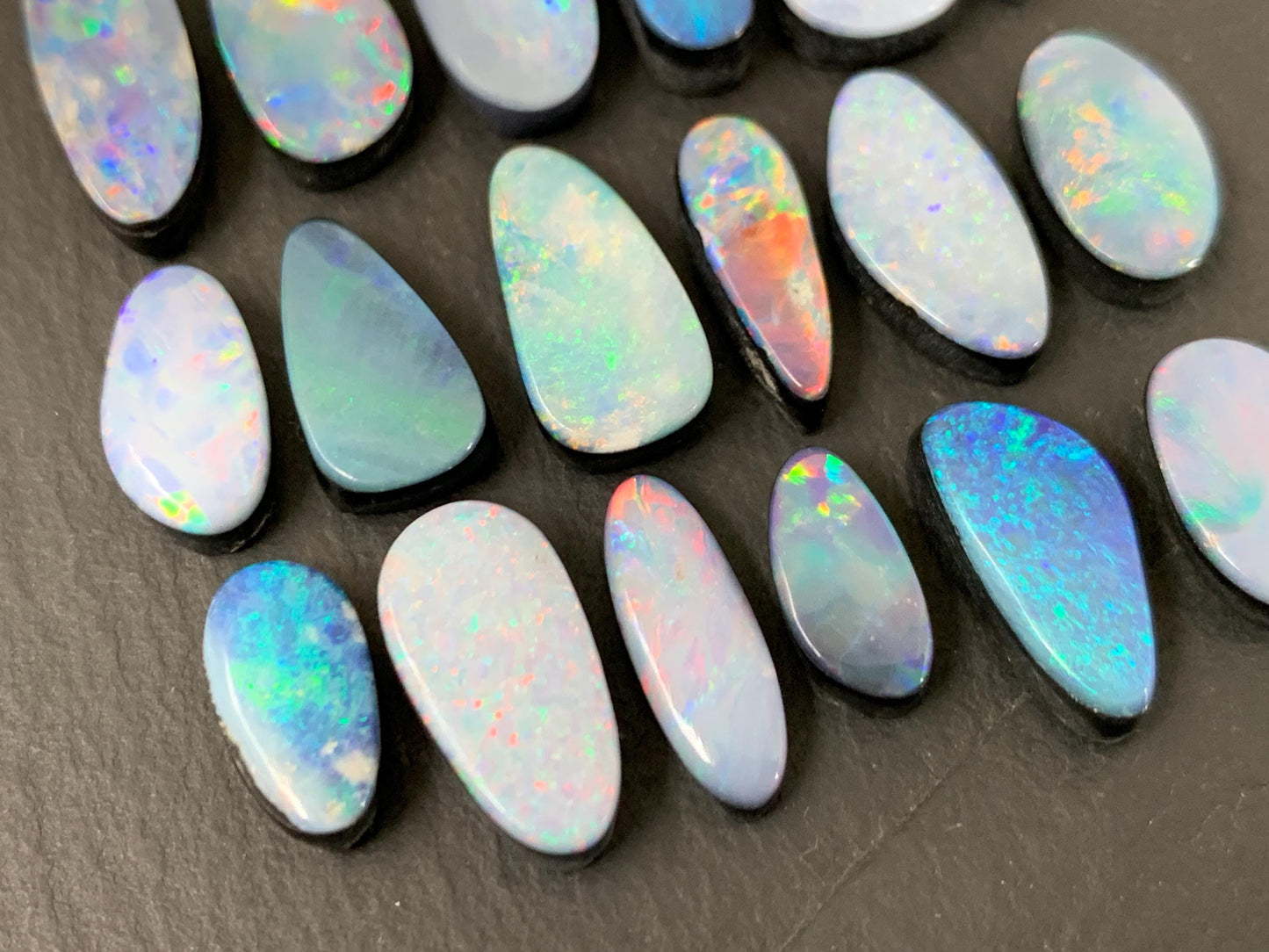Australian Opal doublet 11-16mm long cabochon