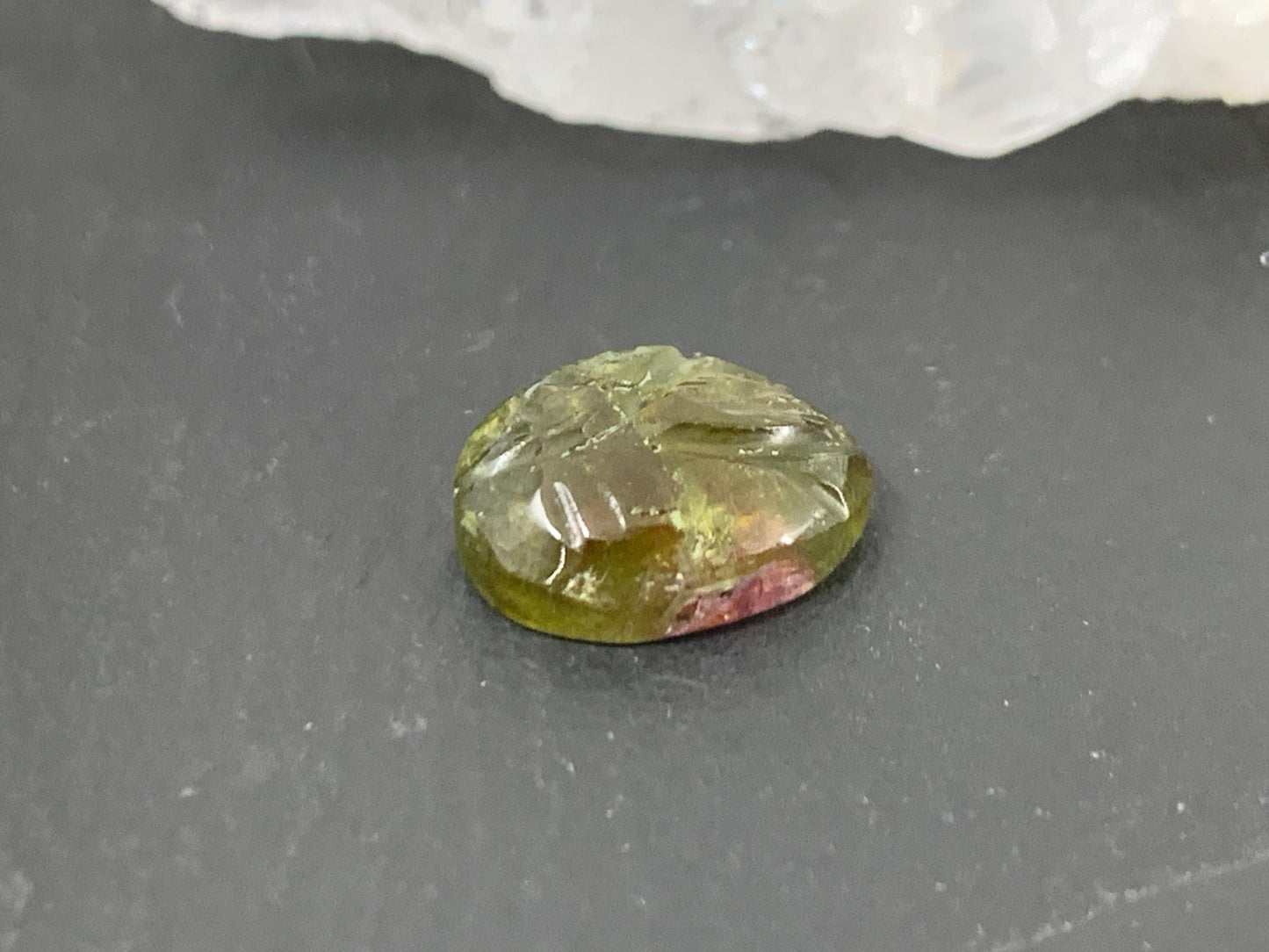 Carved Tourmaline 9x11x4mm cabochon