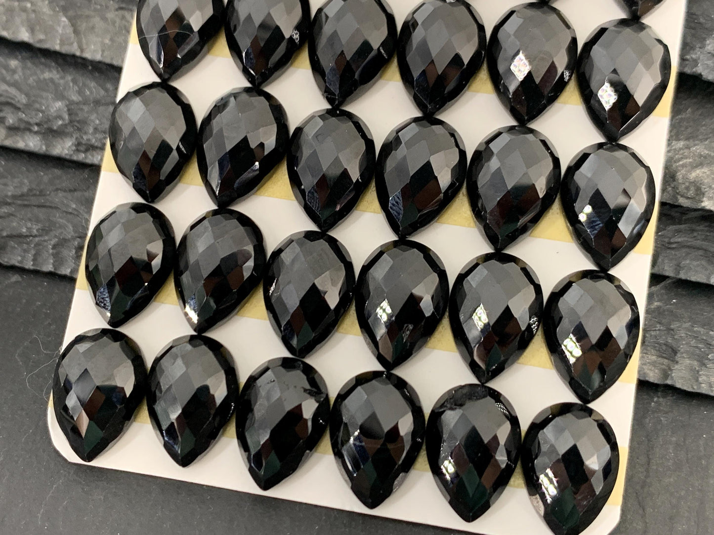 Faceted Black Spinel pear 10x14mm cabochon