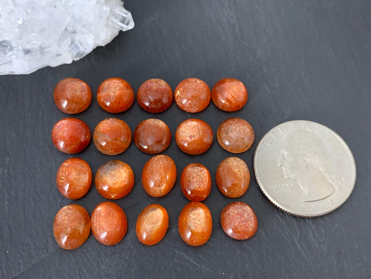 Sunstone round, oval 9-10mm long cabochon