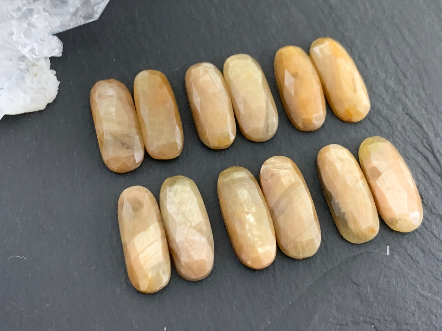 Pair of faceted Yellow Sapphire oval 8x20mm cabochon