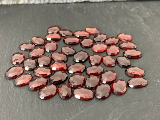 Faceted Mozambique Garnet 8-9.5mm long oval Cabochon