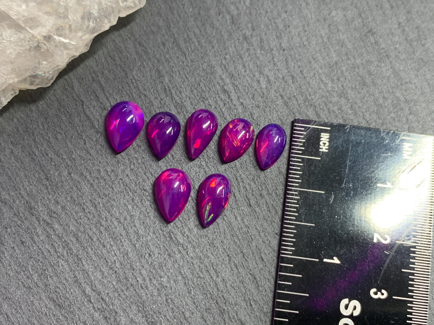 Ethiopian Opal pear 9-10mm long cabochon - Natural Opal smoked to purple color