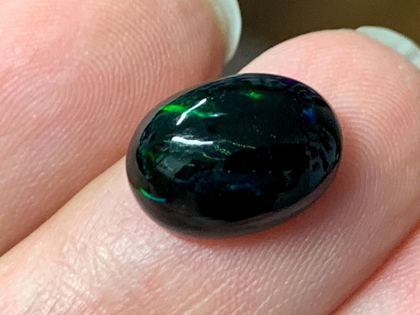 Natural Ethiopian Black Opal 9x12x6mm cabochon
