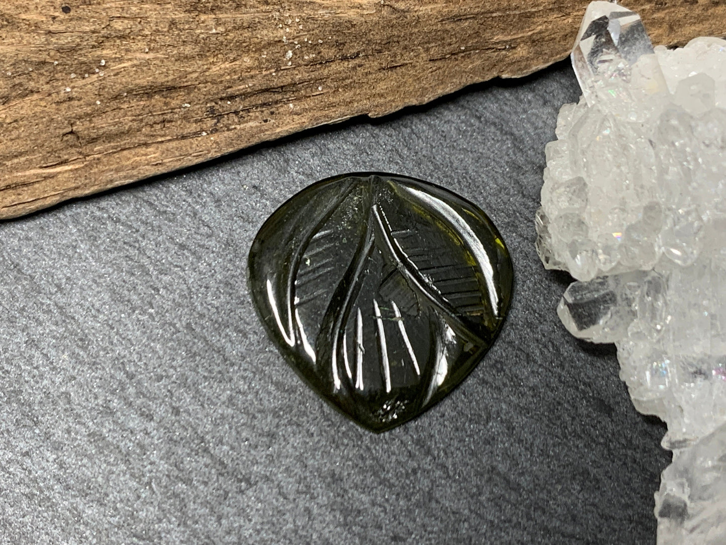 Carved Tourmaline 16x16x2mm cabochon