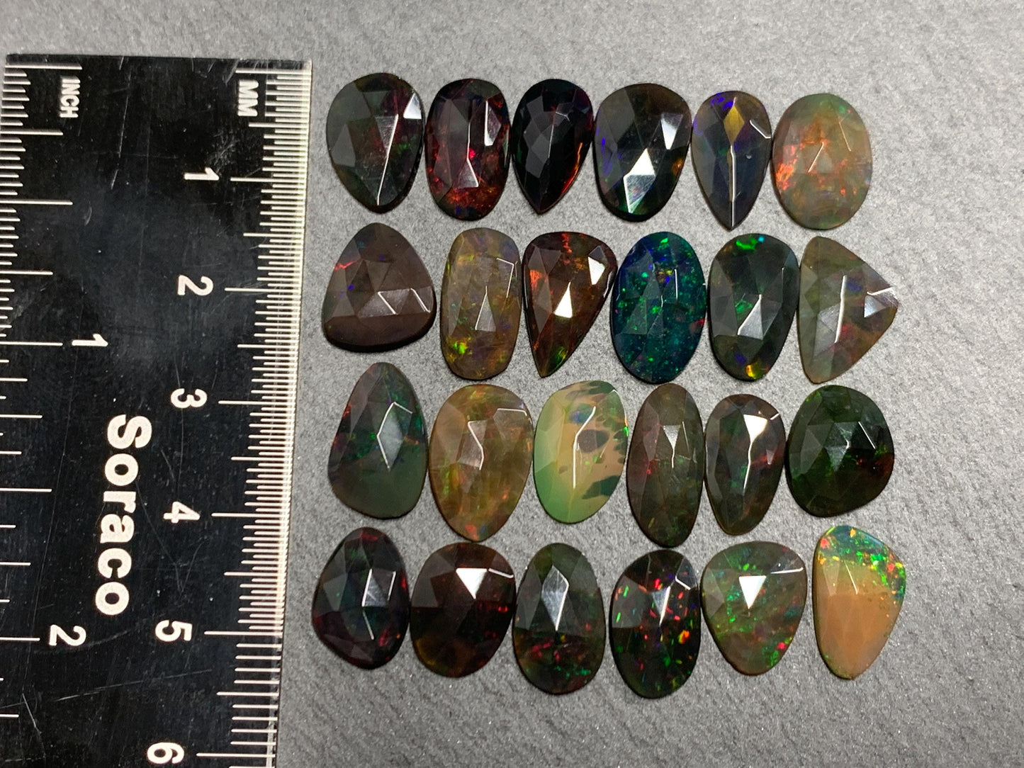Faceted Black Opal 11-14mm long free form cabochon