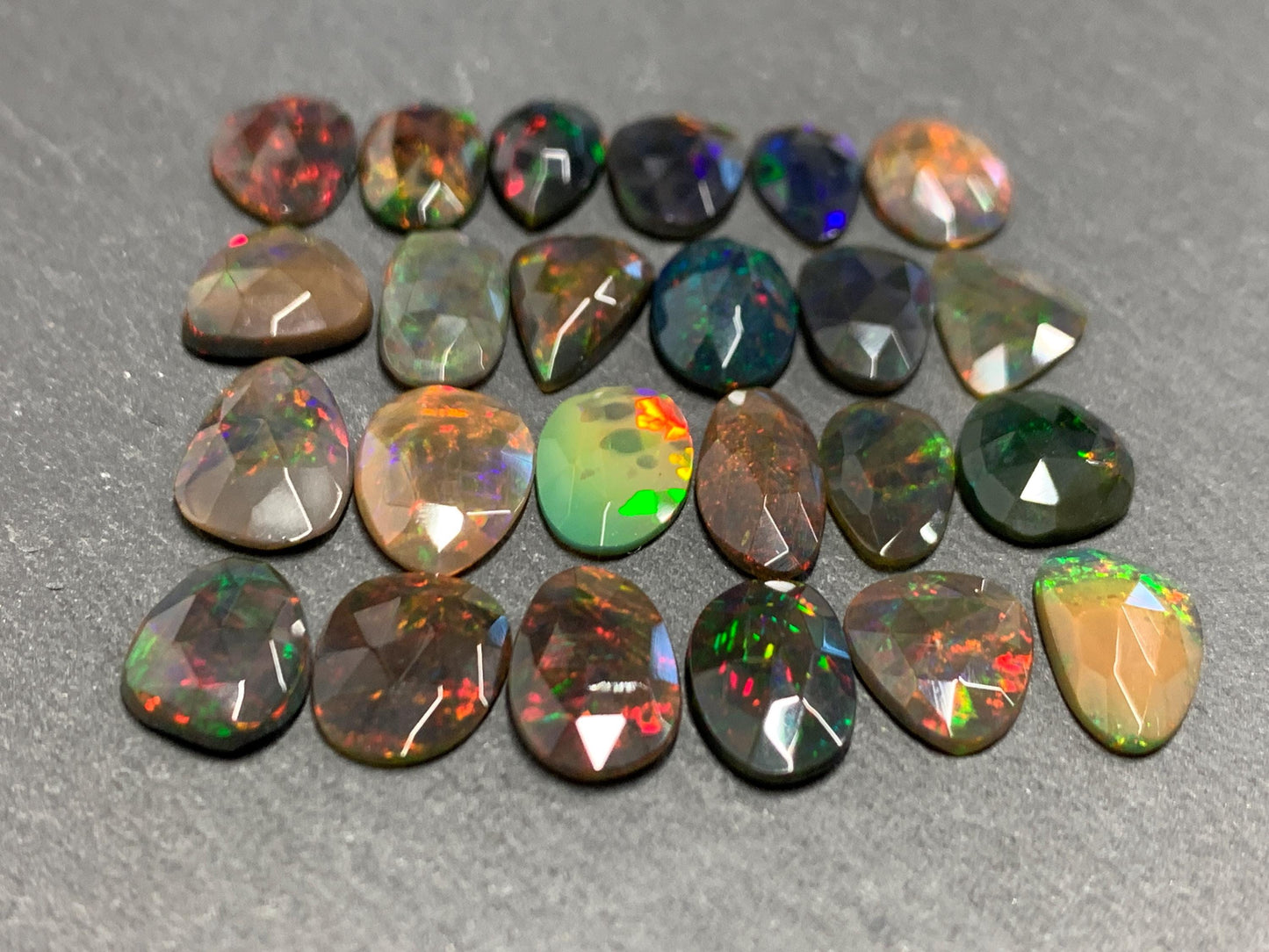 Faceted Black Opal 11-14mm long free form cabochon
