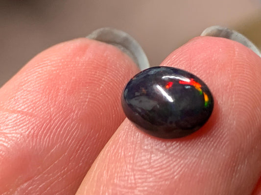 Natural Ethiopian Black Opal 7x9x3mm cabochon