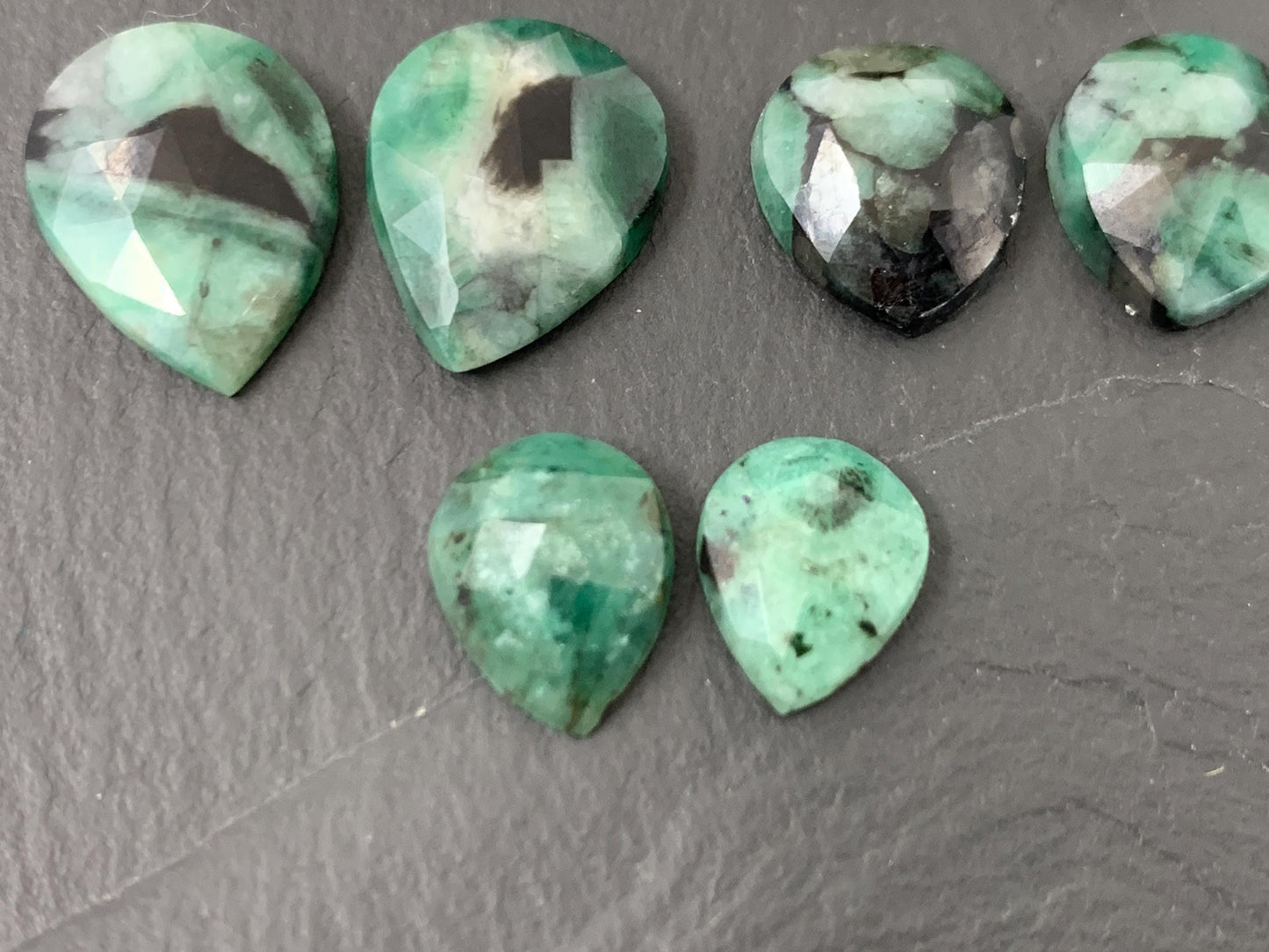 Faceted Emerald Pair 10-16mm long cabochons
