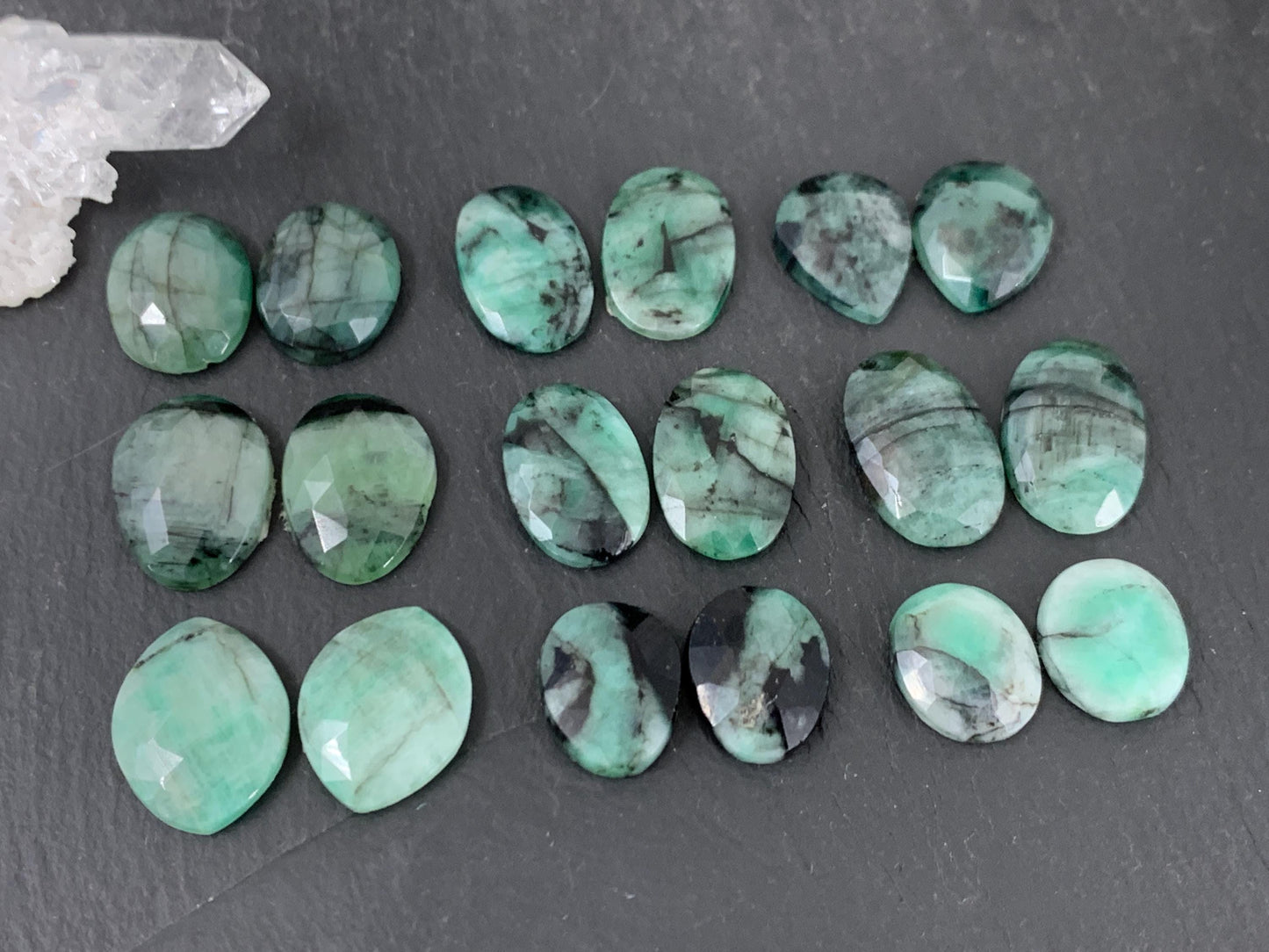 Faceted Emerald pair 14-18mm long cabochon