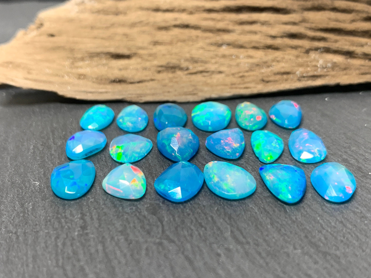 Faceted Blue Ethiopian Opal 11-12mm long cabochon
