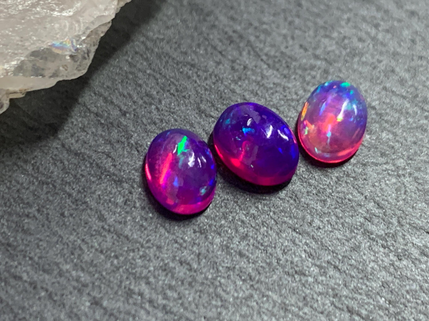 Ethiopian Opal oval 5x7mm cabochon - Natural Opal smoked to purple color