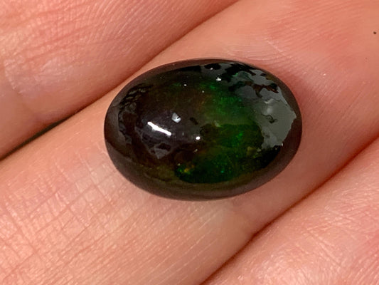 Natural Ethiopian Black Opal 10x14x6mm cabochon