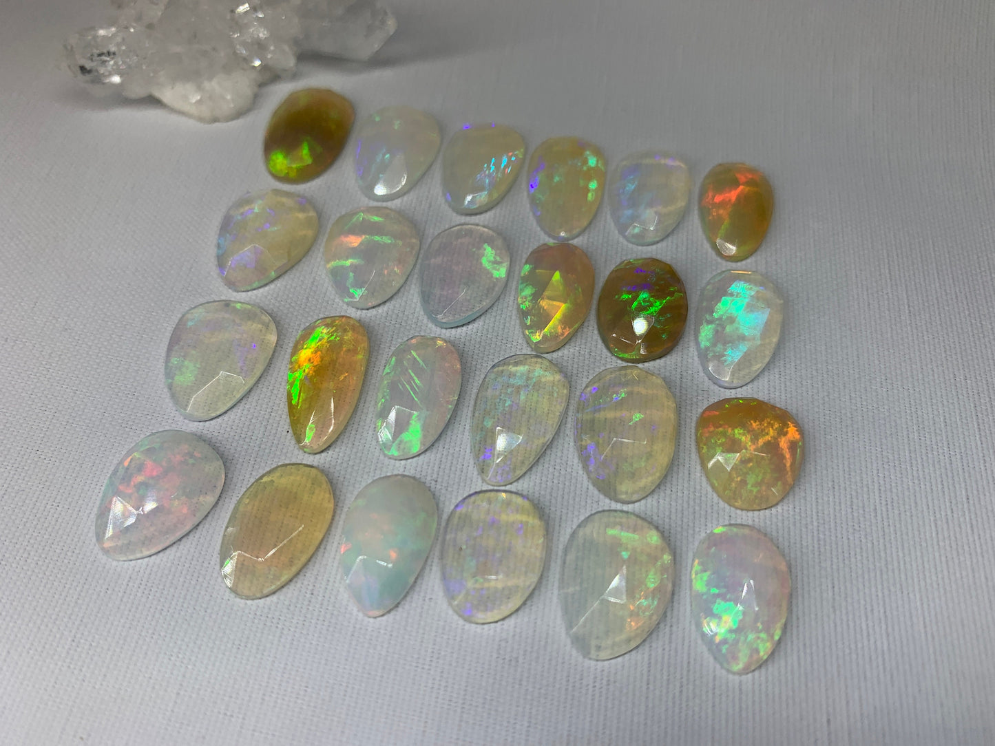 Faceted Ethiopian Opal 14-16mm cabochon