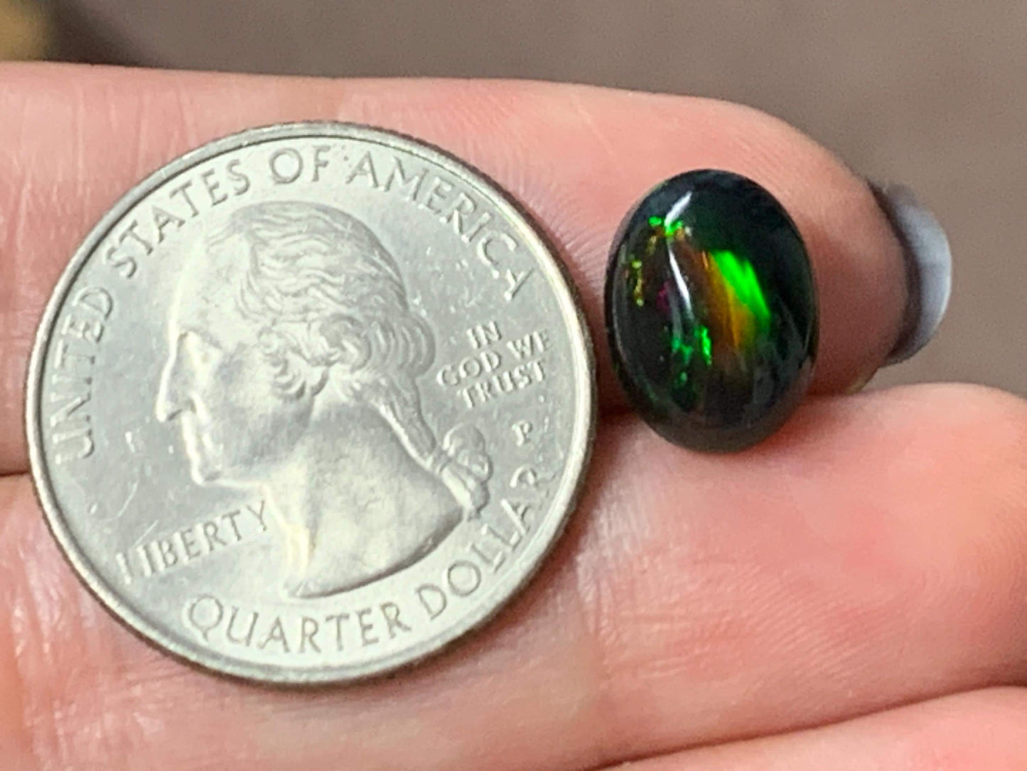 Natural Ethiopian Black Opal 9x12x5mm cabochon
